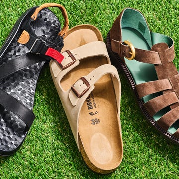 Three different styles of sandals on grass. Three different styles of sandals on grass.